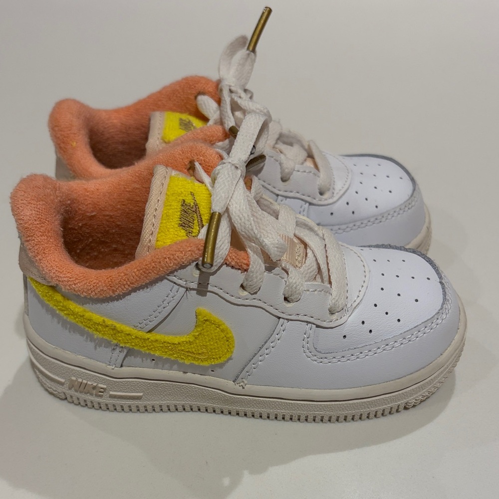 Nike Kids White and Yellow Sneakers with Orange Accents